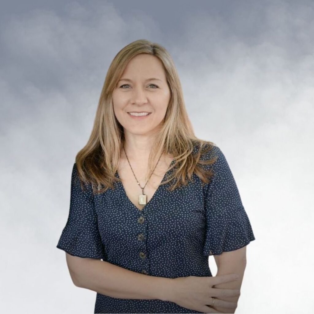 Kerry Johnson on cloudy background